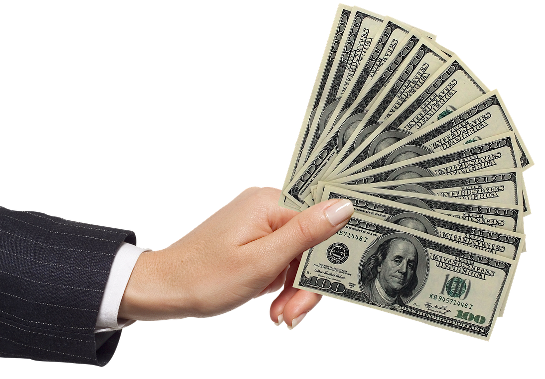 Une main tend des billets